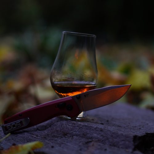SOG Terminus XR - Outdoor - evening Image with whisky on a stone
